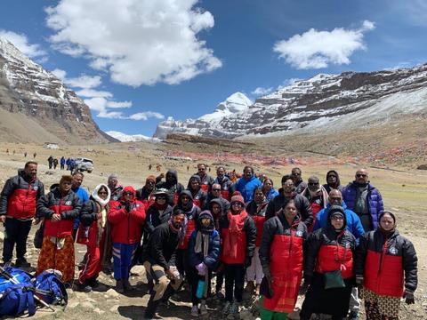 A Coral Yatra group in red jackets on the Kailash route